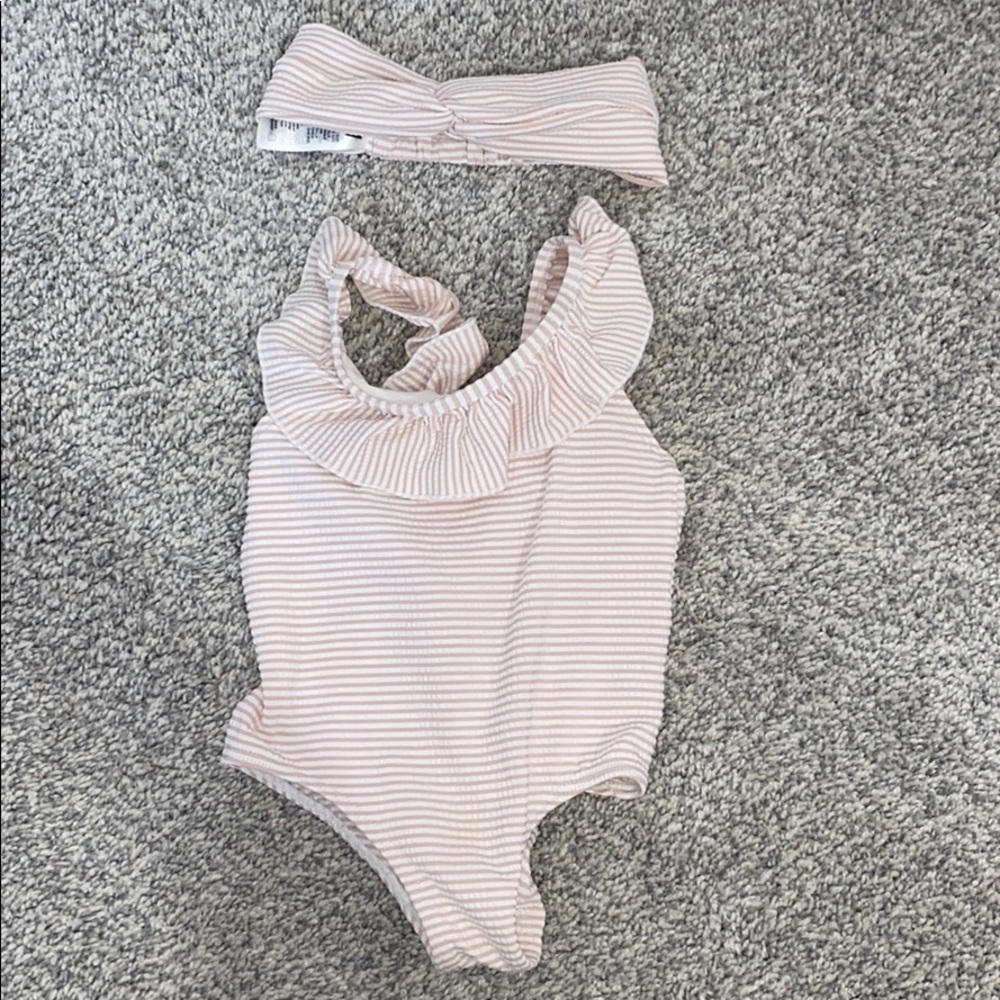 Striped pale pink baby girl swimwear
